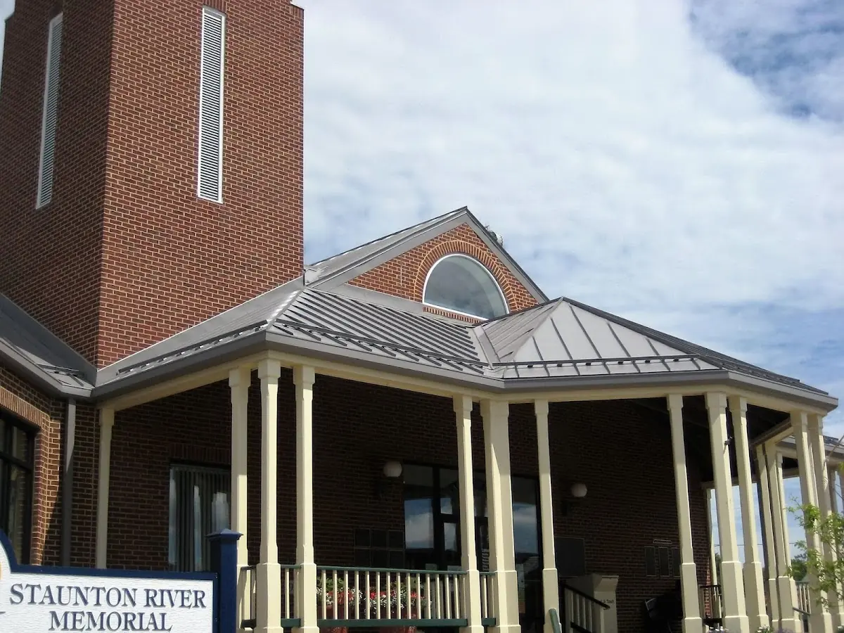 Skilled roofing craftsmen working on a residential roof in Madison - Eastend